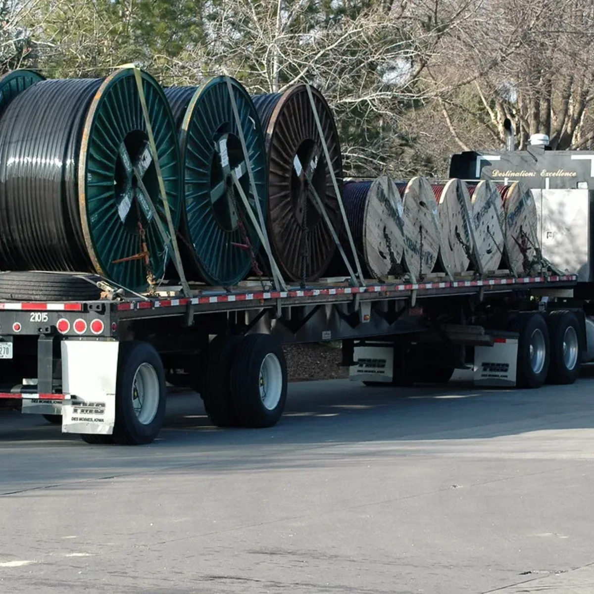 Reels of cable loaded on a flatbed truck