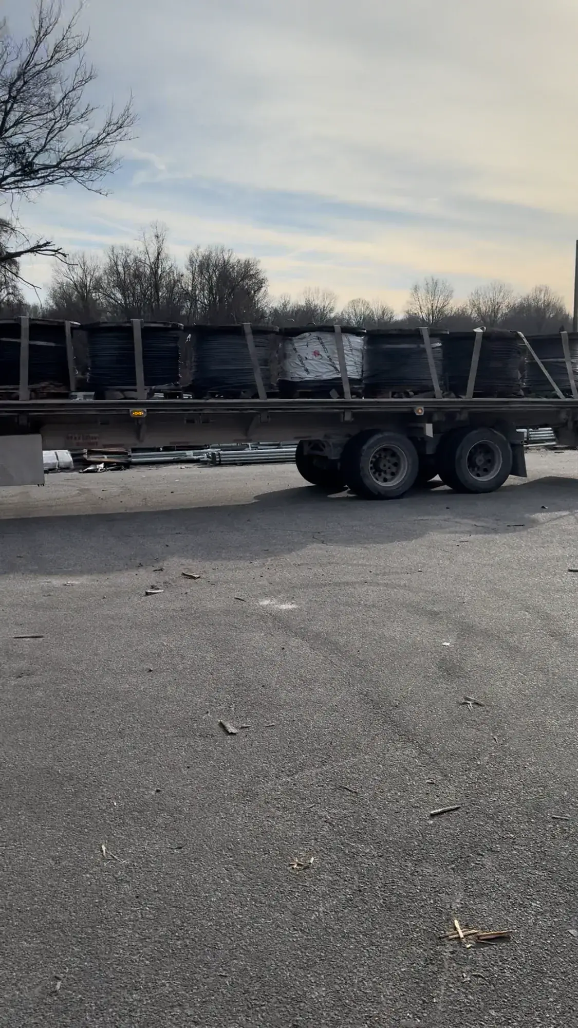 Flatbed trailer loaded with electrical equipment for pickup
