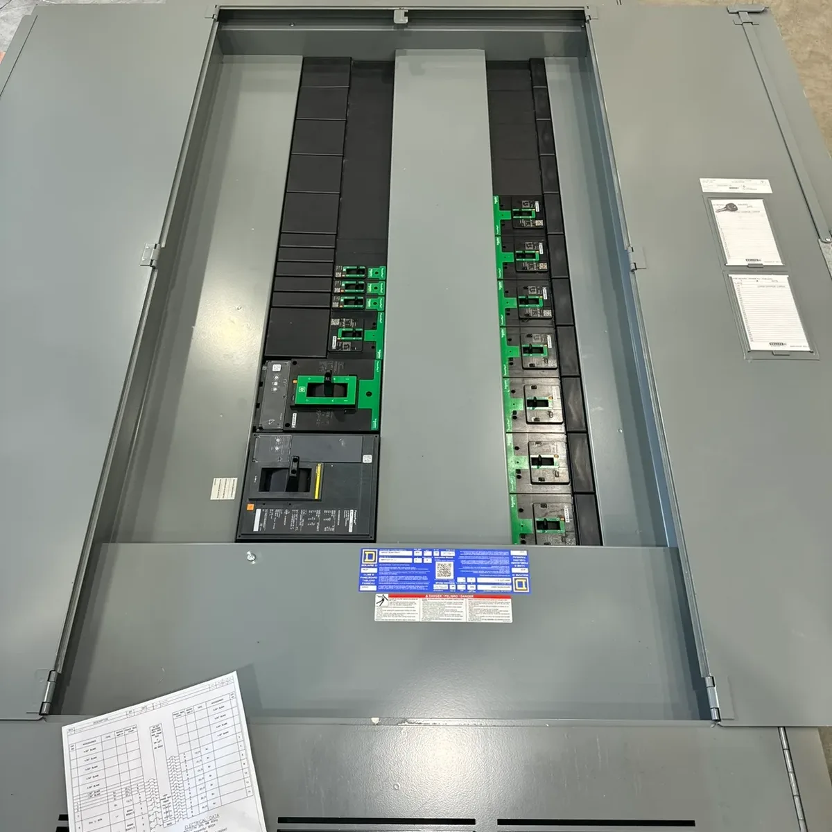 Panelboard interior showing rows of branch circuit breakers